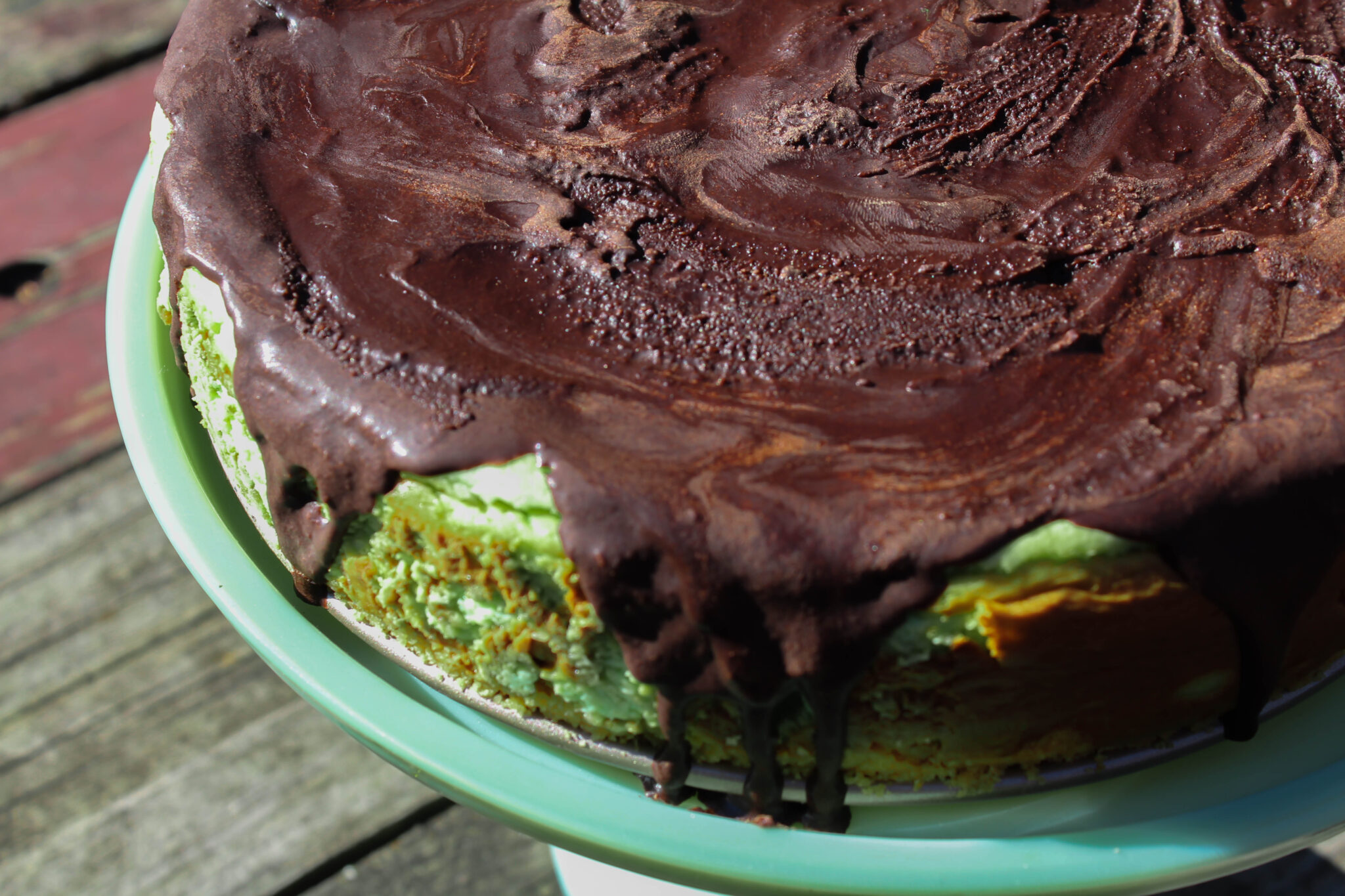 My Shamrock Cheesecake is the perfect way to celebrate St. Patrick's Day! A minty cheesecake with a delectable chocolate topping. What could be better?