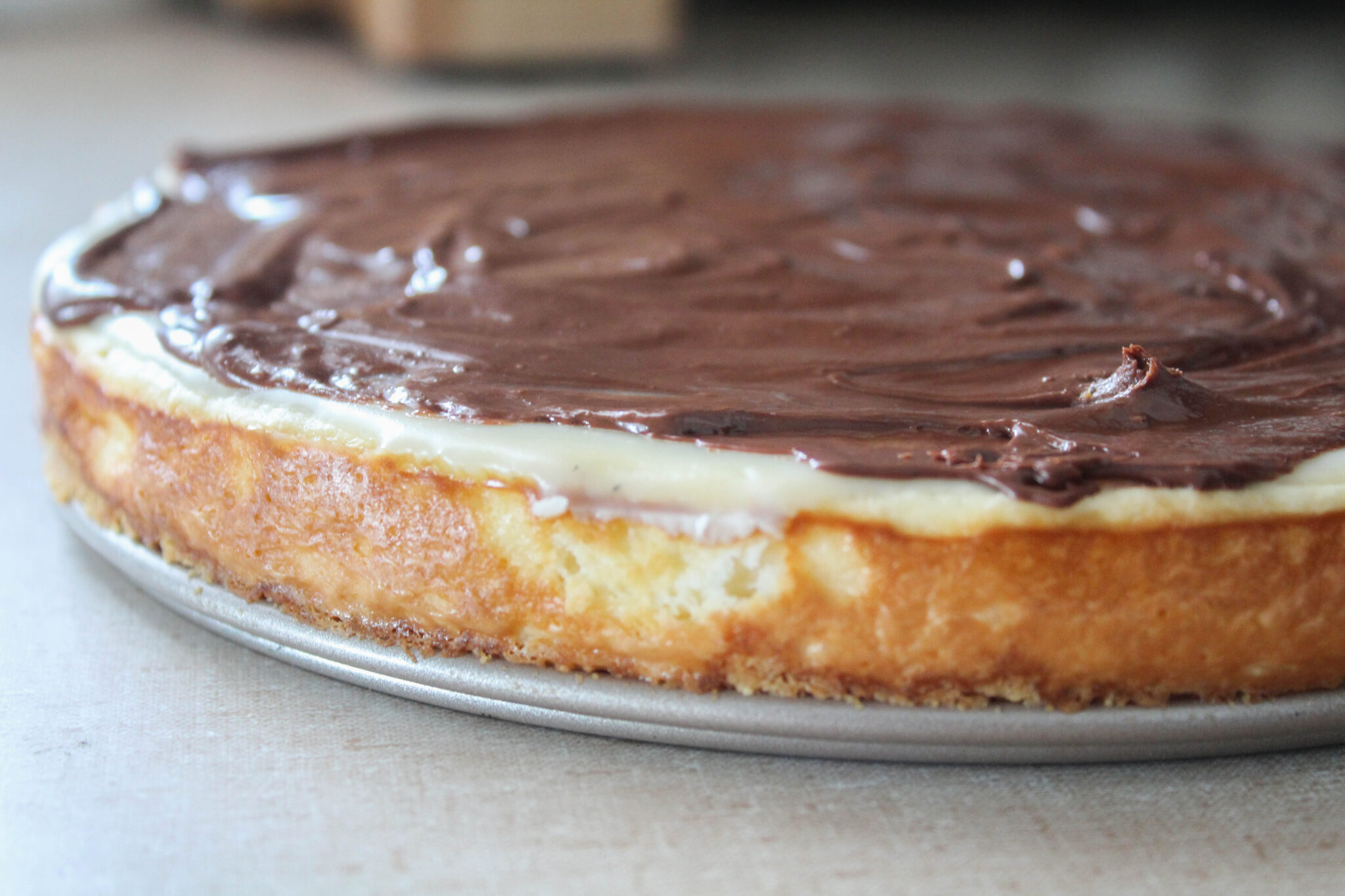 My Twix Cheesecake is like a candy bar in a pan! A smooth filling topped with silky caramel and chocolate. What could be better? 