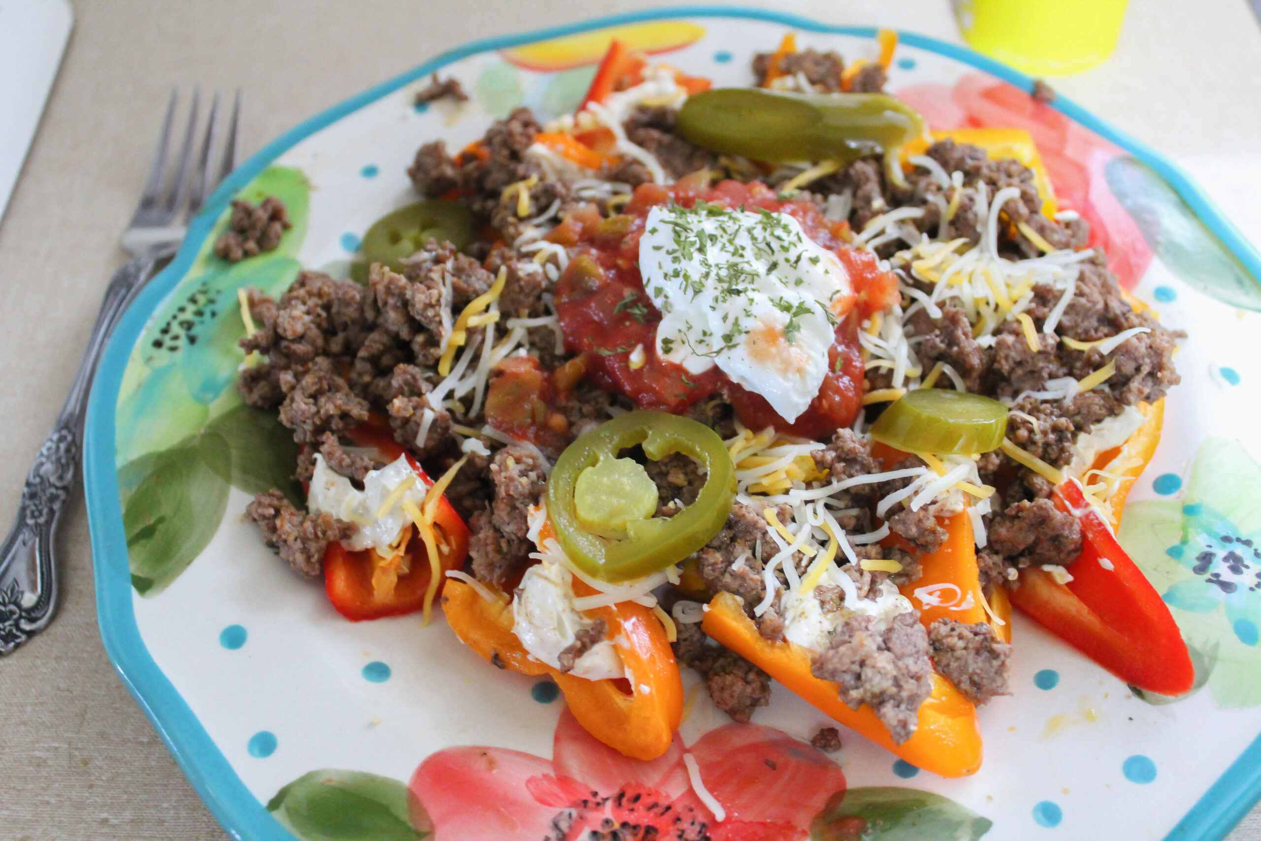 Say yes to nachos and no to carbs without losing the crunch factor! Try my Keto Bell Pepper Nachos. They're creamy, filling, and delish!