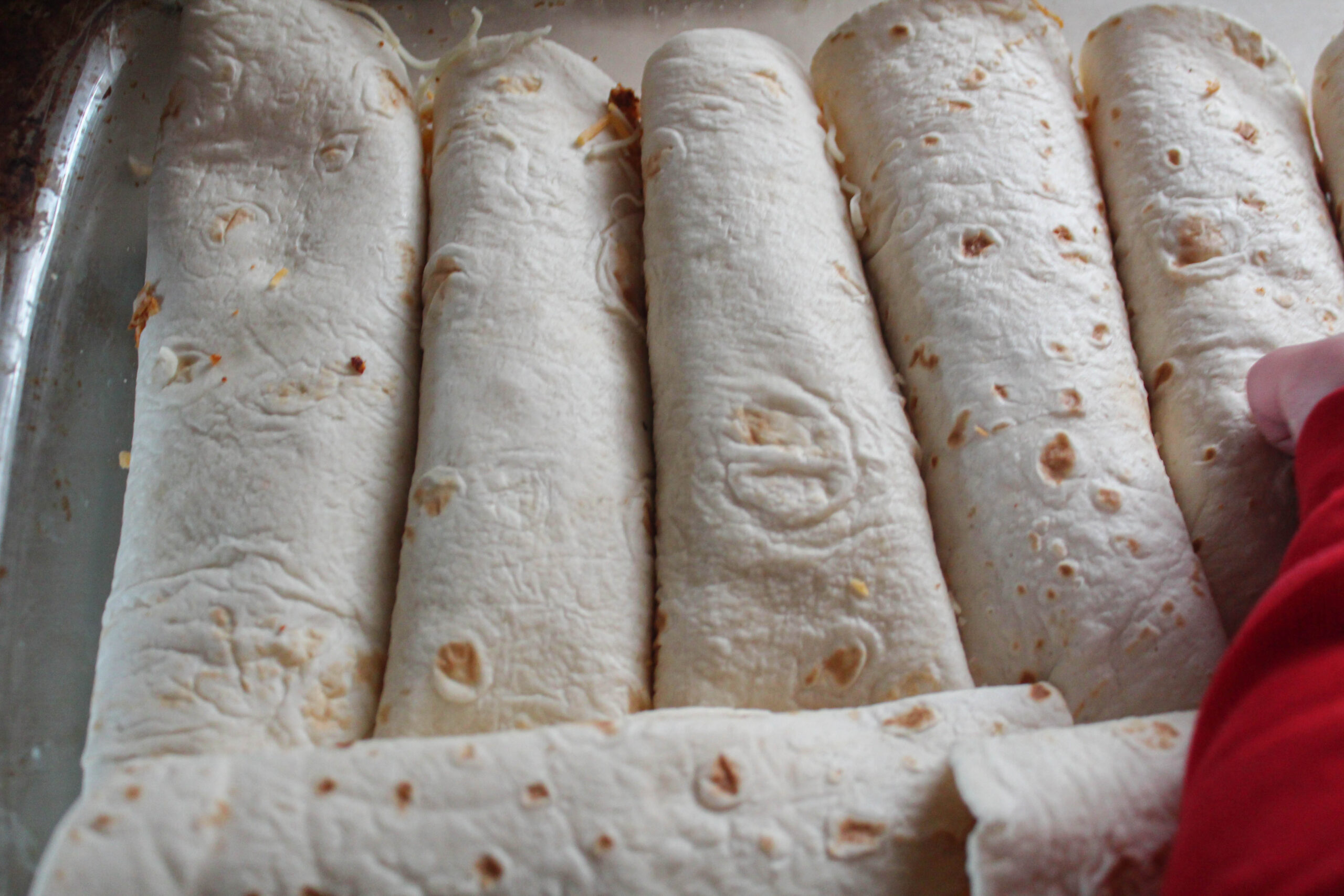 Need a simple, family-friendly dinner? Try my Ranch Chicken Enchiladas! They feature a creamy sauce and flavorful shredded chicken. 