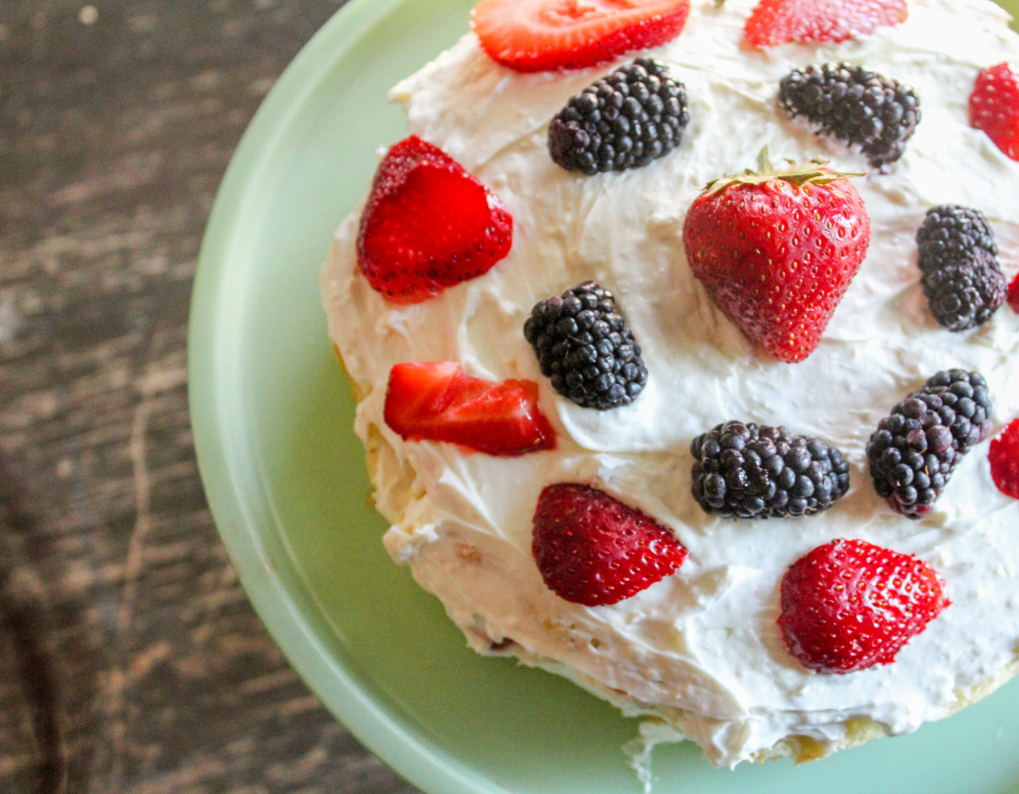 My Berries and Cream Cake is not only delicious but beautiful! It has two decadent layers stuffed with a cream cheese icing and berries! 